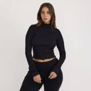 Altar'd State black ribbed turtleneck top with lettuce trim